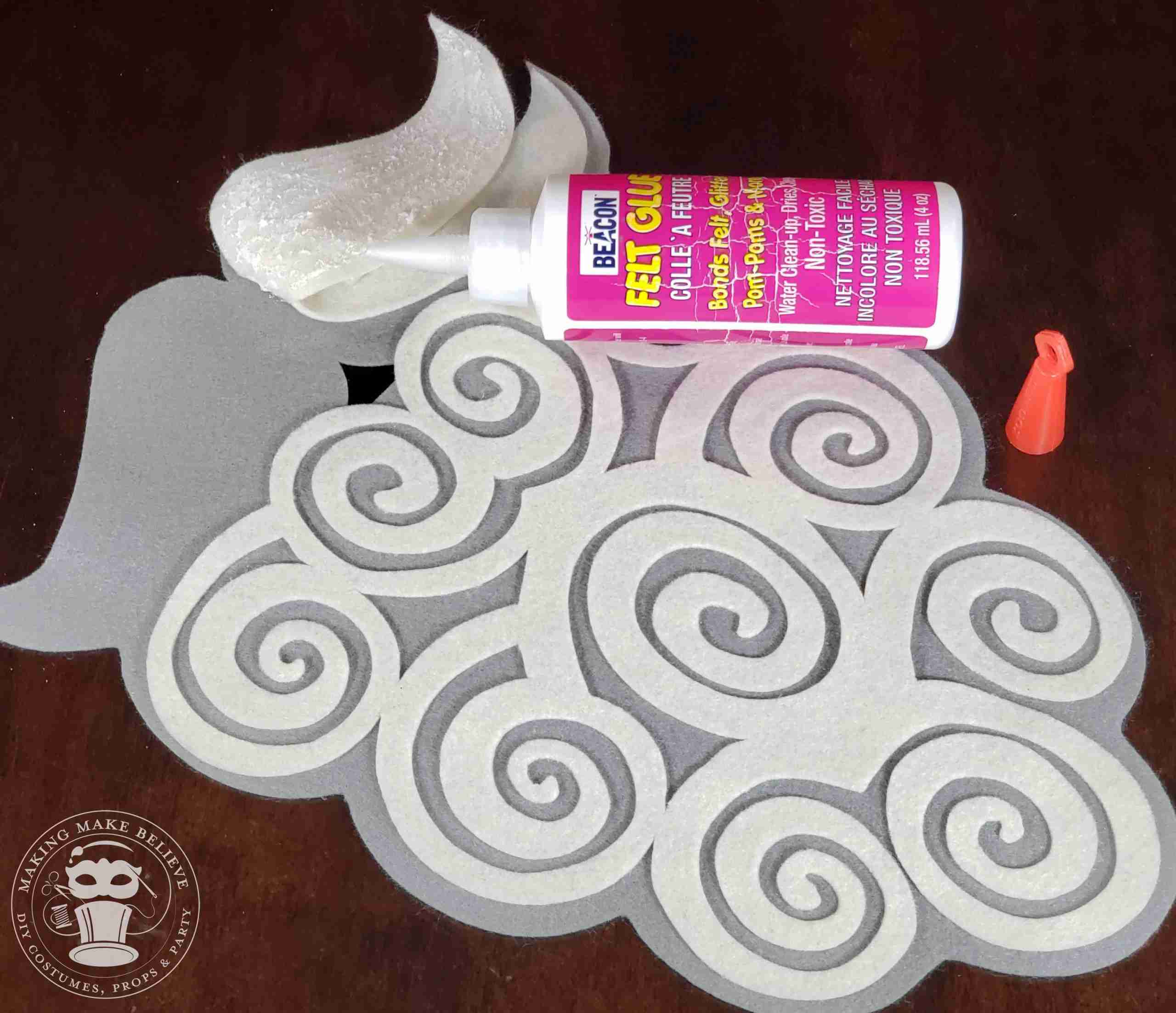 Glue overlay beard and mustache to base