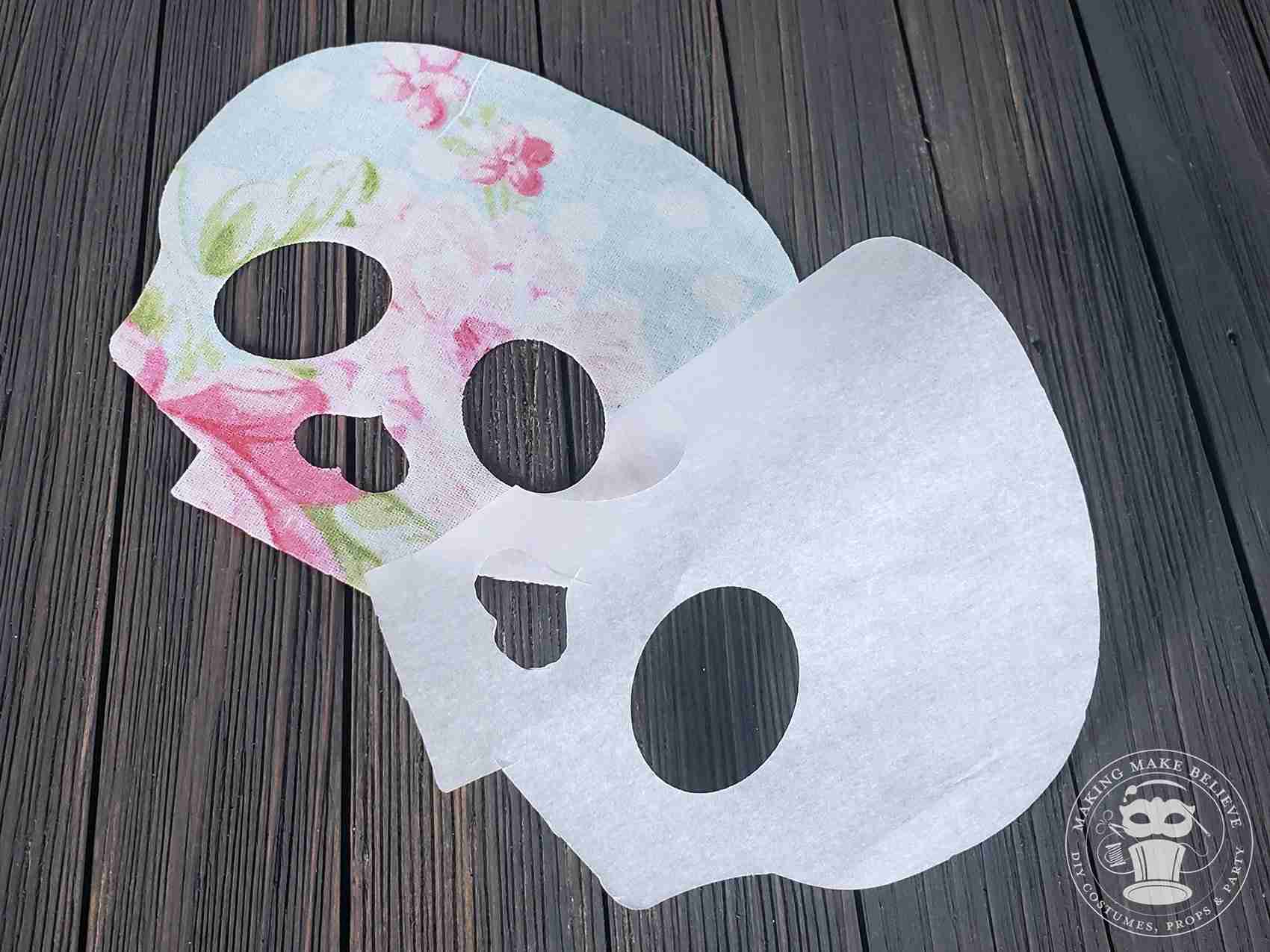 Peel paper backing from skull face